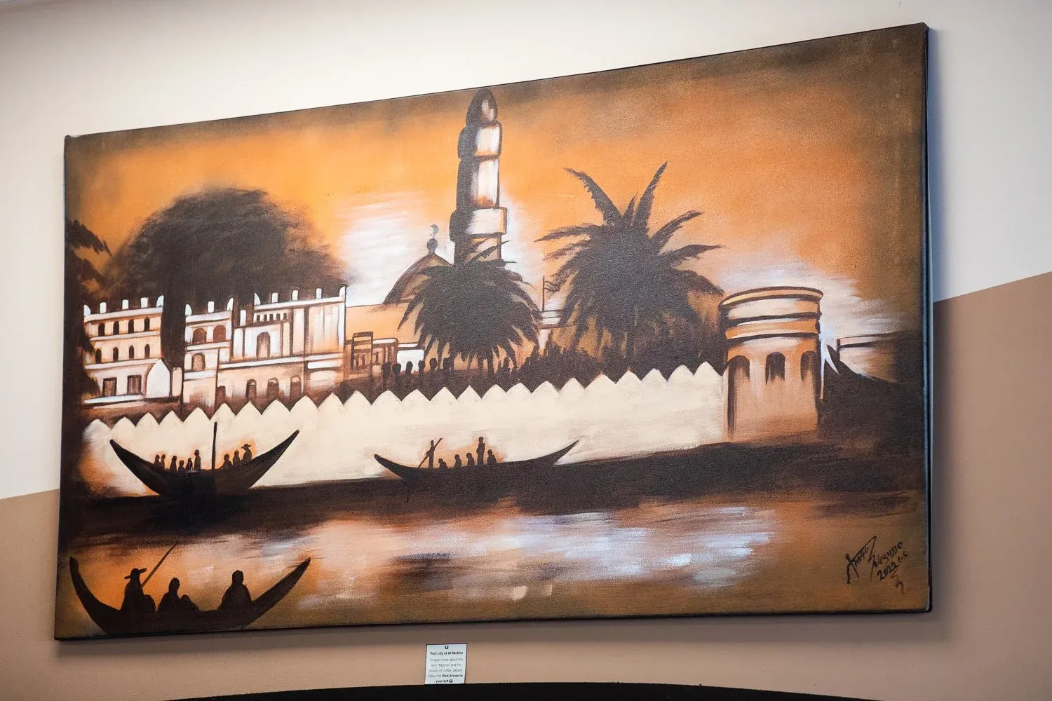 Painting of the historic Port of Mokha hanging in the cafe